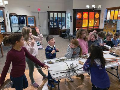 Marion Natural History Museum
On November 30, the Marion Natural History Museum's after-school group had a chance to learn about the different types of trees in our area and to look at some equipment used by foresters to help protect our trees. By looking at a tree "cookie," we were able to count the rings to determine its age and learn about the services, the different sections, including the heart wood, sap wood and bark or phloem provides the tree. 
