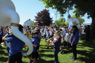 Marion’s Memorial Day Remembrances
Young and old participated in Marion’s Memorial Day Remembrances held at the Music Hall and Old Landing. Old Rochester junior Emerson Roy of Fairhaven sang “God Bless America,” ORR eighth-grader Sophie Zhou of Marion read The Gettysburg Address, and joining the march were the Sippican School Marching Band and Portuguese American Band, and the Cub Scouts, Boy Scouts and Girl Scouts of Marion, who led the Pledge of Allegiance. Tabor Academy sophomore Gia Boyd of Marion read “In Flanders Fields,” and Air Force
