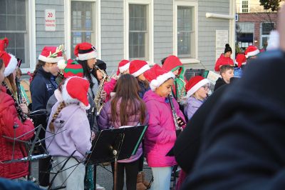 2024 Marion Christmas Stroll
The 2024 Marion Christmas Stroll took place on December 8. Pictured are Carolers outside The Sippican Historical Society (top), Mr. and Mrs. Clause riding their carriage on Front Street (left), and Santa arriving by tugboat (bottom). Photos by Sam Bishop and Mick Colageo.
