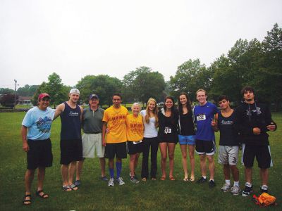 MR5K
Runners and volunteers celebrate after the completion of the Marion Village 5K. Photo by Joan Hartnett-Barry.
