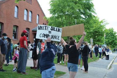 Kneel for Nine
A peaceful crowd gathered on the lawn of the Marion Music Hall on June 2 to kneel in solidarity for nine minutes calling for justice for the death of George Floyd and accountability for police brutality. Marion Police Chief John Garcia dressed in his police uniform was among the roughly 200 kneeling on the grass that afternoon. Photos by Jean Perry
