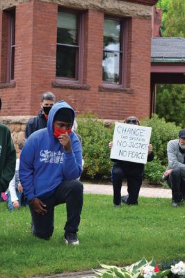 Kneel for Nine
A peaceful crowd gathered on the lawn of the Marion Music Hall on June 2 to kneel in solidarity for nine minutes calling for justice for the death of George Floyd and accountability for police brutality. Marion Police Chief John Garcia dressed in his police uniform was among the roughly 200 kneeling on the grass that afternoon. Photos by Jean Perry
