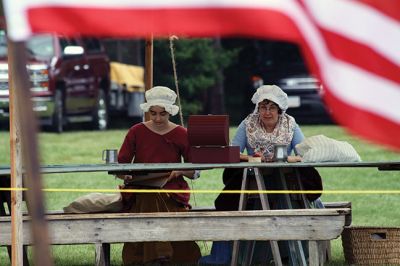 Living History 
It looked like July 8, 1776 at Silvershell Beach in Marion this past Saturday. Folks from the Fairhaven Village Militia and Wareham Militia Group in conjunction with Marion Recreation and the Marion Cultural Council took spectators back in time to Colonial Massachusetts during a weekend-long encampment at the beach. Participants in olde-tyme apparel demonstrated what life was like in the 1770s during the Revolutionary War through demonstrations of drilling, cooking, and flintlock musket use. Photos by Jean 
