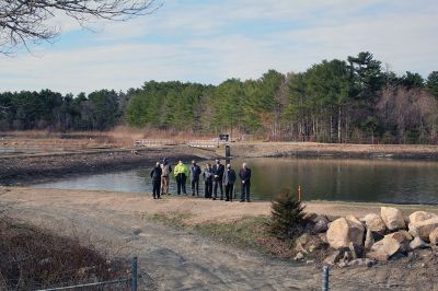 Marion Wastewater Treatment Plant Assistant
Representative William Straus, Marion Sewer Superintendent Frank Cooper, Wastewater Treatment Plant Assistant Operator Nathaniel Munafo, Marion Board of Selectmen Chairman Randy Parker, Finance Director Judy Mooney, Town Administrator Jay McGrail, and Selectmen John Waterman and Norm Hills gathered on April 2 at the wastewater treatment plant off Benson Brook Road, where Straus presented the Marion delegates with a $250,000 check. Photo by Mick Colageo
