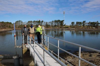 Marion Wastewater Treatment Plant Assistant
Representative William Straus, Marion Sewer Superintendent Frank Cooper, Wastewater Treatment Plant Assistant Operator Nathaniel Munafo, Marion Board of Selectmen Chairman Randy Parker, Finance Director Judy Mooney, Town Administrator Jay McGrail, and Selectmen John Waterman and Norm Hills gathered on April 2 at the wastewater treatment plant off Benson Brook Road, where Straus presented the Marion delegates with a $250,000 check. Photo by Mick Colageo
