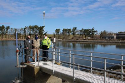 Marion Wastewater Treatment Plant Assistant
Representative William Straus, Marion Sewer Superintendent Frank Cooper, Wastewater Treatment Plant Assistant Operator Nathaniel Munafo, Marion Board of Selectmen Chairman Randy Parker, Finance Director Judy Mooney, Town Administrator Jay McGrail, and Selectmen John Waterman and Norm Hills gathered on April 2 at the wastewater treatment plant off Benson Brook Road, where Straus presented the Marion delegates with a $250,000 check. Photo by Mick Colageo
