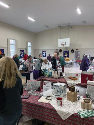 Holiday Fairs
With the scent of fresh baked goodies wafting in the village air, people flocked to Mattapoisett, taking in the splendiferous, handmade holiday crafts and goods on display at St. Anthony’s Catholic Church and nearby Congregational Church annual fairs. Holiday music added to the charm enjoyed by many. Photos by Marilou Newell
