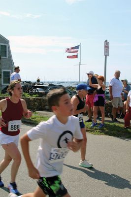 Mattapoisett Road Race
Will Benoit and Margot Appleton defended their respective men’s and women’s titles in the July 4 Mattapoisett Road Race, and competitors were greeted by favorable weather for the 9:00 am start. Photos by Mick Colageo
