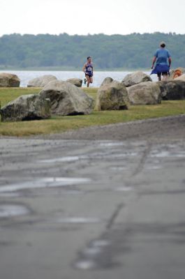 Mattapoisett Road Race
On Wednesday, July 4, over 1,000 runners braved the rain to participate in the Annual Mattapoisett Road Race.  All money raised from the 5-mile race will benefit graduating students from Old Rochester Regional High School.  Photo by Felix Perez.
