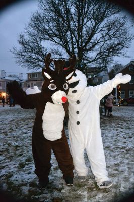 Holiday in the Park
It looked like another record turnout at Shipyard Park in Mattapoisett on December 9 for the annual Holiday in the Park and tree lighting. The tent was stuffed with hot foods, cocoa, donuts, Christmas cookies, and the hundreds of people in line to warm up out of the snowy cold. Did you miss the tree lighting? See The Wanderer Facebook page for a video capturing the magical moment. Photos by Jean Perry 
