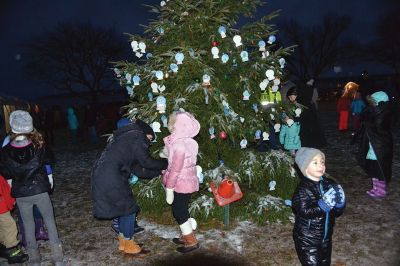 Holiday in the Park
It looked like another record turnout at Shipyard Park in Mattapoisett on December 9 for the annual Holiday in the Park and tree lighting. The tent was stuffed with hot foods, cocoa, donuts, Christmas cookies, and the hundreds of people in line to warm up out of the snowy cold. Did you miss the tree lighting? See The Wanderer Facebook page for a video capturing the magical moment. Photos by Jean Perry 
