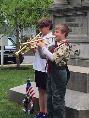 Mattapoisett Memorial Day
Mattapoisett Board of Selectmen along with members of the American Legion Florence Eastman Post 280, Rep. William Straus, and special guest Col. Chris Kidd attended the Memorial Day observances at Center School on May 28. The Old Hammondtown School concert band under the direction of Cara Kinney played patriotic tunes to a full house, and afterwards the Memorial Day parade headed to the Civil War monument at the library. Photos by Marilou Newell
