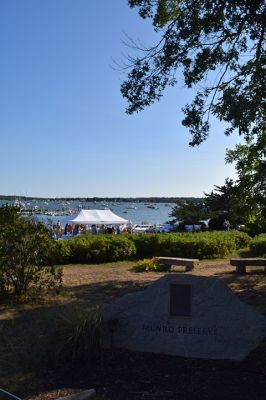 The Great Community Picnic 
Mattapoisett Museum and the Mattapoisett Land Trust held The Great Community Picnic on Thursday, August 7 at Munro Preserve on the water. Tickets were sold out and the venue was filled up. Oysters were served alongside beer and whatever food the over 20 different tables decided to bring. As with previous years, the table with the best theme won the night, that being Table 5 with their Disney theme. Photo by Sam Bishop
