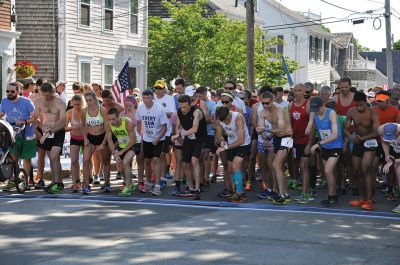 Race to the Finish 
July 4th morning in Mattapoisett means its time for the annual Mattapoisett July 4th Road Race, a five-miler that starts and finishes at Shipyard Park. The proceeds fund scholarships to ORR graduates. Photos by Sarah French Storer
