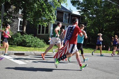 Race to the Finish 
July 4th morning in Mattapoisett means its time for the annual Mattapoisett July 4th Road Race, a five-miler that starts and finishes at Shipyard Park. The proceeds fund scholarships to ORR graduates. Photos by Sarah French Storer
