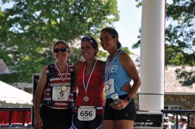 Race to the Finish 
July 4th morning in Mattapoisett means its time for the annual Mattapoisett July 4th Road Race, a five-miler that starts and finishes at Shipyard Park. The proceeds fund scholarships to ORR graduates. Photos by Sarah French Storer
