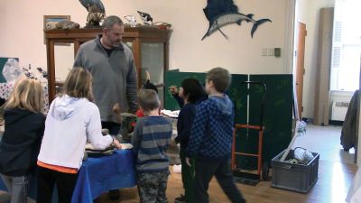  Marion Natural History Museum
The Marion Natural History Museum's afterschool group enjoyed learning about minerals and fossils with geologist Jim Pierson. The group also compared various artifacts such as relative sizes of Megaladon teeth versus White Shark, and took a look at many examples of fossils such as fish, leaves, and the tiny tracks of a trilobite. Many thanks to Jim for his wonderful program, and to the Tabor community service volunteers for their help with the program. Photos courtesy Elizabeth Leidhold
