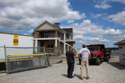 Marion Harbormaster
Construction continues on the new Maritime Center in the northeast corner of Island Wharf. Meantime, Marion’s Harbormaster Department will continue working out of the old building, albeit in a new location just down the wharf. Photos by Mick Colageo and courtesy Town of Marion
