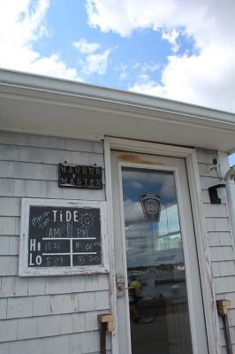 Marion Harbormaster
Construction continues on the new Maritime Center in the northeast corner of Island Wharf. Meantime, Marion’s Harbormaster Department will continue working out of the old building, albeit in a new location just down the wharf. Photos by Mick Colageo and courtesy Town of Marion
