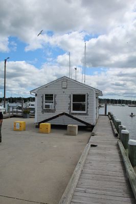 Marion Harbormaster
Construction continues on the new Maritime Center in the northeast corner of Island Wharf. Meantime, Marion’s Harbormaster Department will continue working out of the old building, albeit in a new location just down the wharf. Photos by Mick Colageo and courtesy Town of Marion
