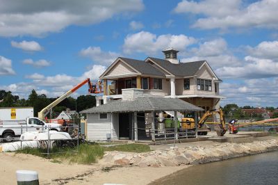 Marion Harbormaster
Construction continues on the new Maritime Center in the northeast corner of Island Wharf. Meantime, Marion’s Harbormaster Department will continue working out of the old building, albeit in a new location just down the wharf. Photos by Mick Colageo and courtesy Town of Marion
