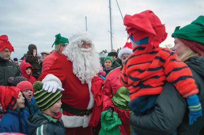 Marion Village Stroll 
The Marion Village Stroll on Sunday includes a visit from Santa who arrived by boat and then was transported by wagon to meet the children. Photo by Felix Perez
