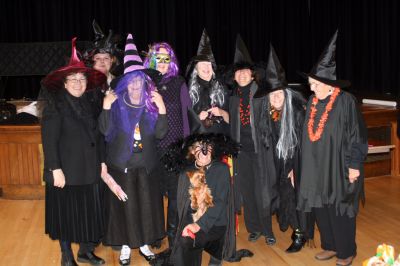 Witches of Marion
The some of the volunteer Witches of Marion (L to R: Mary Ann Hayes, Deborah Bokelkamp, Trudy Kingery, Wendy Bidstrup, Joan Healey, Nancy McFadden, Sally Conkwright, Lee Johns.  Front: Mimi Putnam and Toto.) who brought you the Annual Halloween Parade. Photo by Paul Lopes. November 2, 2009 edition
