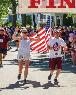 Mattapoisett Road Race 
The 50th running of the Mattapoisett 5 Mile Road Race took place on July 4. Margot Appleton and Trevor Wysong were the respective female and male winners. Photos by Ryan Feeney
