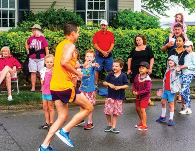 Mattapoisett Road Race
A humid atmosphere challenged the competitors, but the Mattapoisett Road Race was nonetheless conquered by over 1,000 runners. Photos by Ryan Feeney
