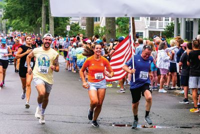 Mattapoisett Road Race
A humid atmosphere challenged the competitors, but the Mattapoisett Road Race was nonetheless conquered by over 1,000 runners. Photos by Ryan Feeney
