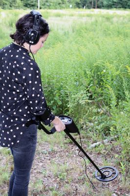 Metal Detector Mania 
It took a while, but News Editor Jean Perry reckoned with her impatience long enough to encounter a few lost and found objects both in Rochester and her backyard in Fairhaven, curious pets included. Metal detector courtesy of the Mattapoisett Library! Photos by Scott Anderson and Jean Perry
