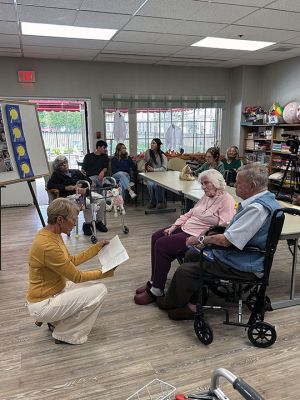 Rudd Wyman
Author Sarah Dickson celebrated her father Rudd Wyman’s 96th birthday on Saturday at Sippican Health Care Center by publicly reading a book she had written from her childhood memories of her dad’s old stories transporting her and her brother on imaginary trips to the moon. Photos by Jeff Wagner
