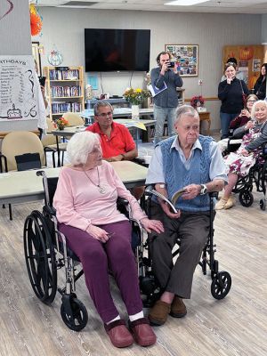 Rudd Wyman
Author Sarah Dickson celebrated her father Rudd Wyman’s 96th birthday on Saturday at Sippican Health Care Center by publicly reading a book she had written from her childhood memories of her dad’s old stories transporting her and her brother on imaginary trips to the moon. Photos by Jeff Wagner
