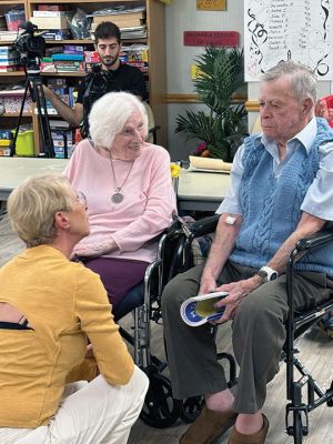 Rudd Wyman
Author Sarah Dickson celebrated her father Rudd Wyman’s 96th birthday on Saturday at Sippican Health Care Center by publicly reading a book she had written from her childhood memories of her dad’s old stories transporting her and her brother on imaginary trips to the moon. Photos by Jeff Wagner
