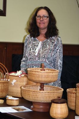 Nantucket Baskets
Melanie Dupuis and Rick Padelford demonstrated the art of Nantucket basket weaving at the Mattapoisett Free Public Library on May 6. Dupuis, a former cobbler, and Padelford are master basket weavers who have been studying and teaching the craft for many years. Dupuis said that the Nantucket baskets are known all over the world for their beauty and practicality. Photo by Marilou Newell
