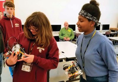 Old Colony “Vex team”
Old Colony “Vex team” engineering students visited Old Hammondtown School on October 24 and showed off some mad robotics skills. Jake Amadea, Tyler Blanchette, Jared Boren, Austin DeSousa, Chris Lambert, Isabella Mauradian, and Leandra Stroud-Jackson from Daniel Brush’s class showed OHS students how they built, programmed, and now operate their robots; something each of the OC engineering students is passionate about. Photos by Lisa Lourenco and E.O. Bednarczyk
