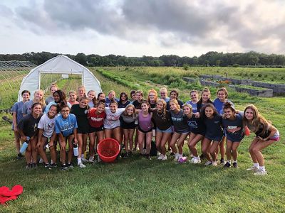 ORR Field Hockey
Each year, the Old Rochester Regional High School field hockey team members engage in a community service project. This year, on September 15, they went to "Sharing the Harvest Community Farm" at the YMCA of Dartmouth. The team worked hard in planting and preparing the fields for the next set of crops. All the produce is donated to 20 local hunger relief programs throughout the South Coast region. Photo courtesy Kate Souza
