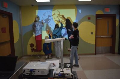 Community Service-Learning Day
A volunteer campus beautification group gathers around the Old Rochester Regional High School mascot, a bulldog, during district's inaugural Community Service-Learning Day held on Wednesday, November 27, 2024. Photo courtesy Old Rochester Regional School District and MA Superintendency Union #55.
