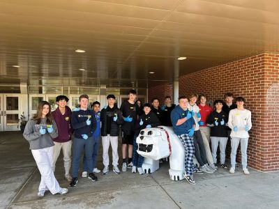 Community Service-Learning Day
A volunteer campus beautification group gathers around the Old Rochester Regional High School mascot, a bulldog, during district's inaugural Community Service-Learning Day held on Wednesday, November 27, 2024. Photo courtesy Old Rochester Regional School District and MA Superintendency Union #55.
