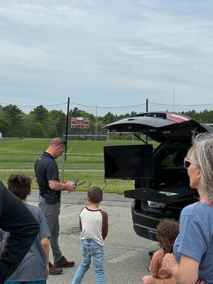 Touch A Truck
A “Touch A Truck” event was hosted at Old Rochester Regional High School on Saturday, May 17. Present were semi-trucks, a school bus, police cruisers, an ambulance, and other smaller vehicles like a side-by-side. Other than trucks, there was a police drone demonstration and stations for arts and crafts. Photos by Sam Bishop
