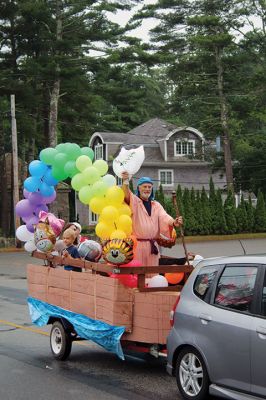 Independence Day Parade
Despite a little bit of rain and a lot of mist, many lined Marion’s streets for the annual Independence Day parade. Photos by Mick Colageo
