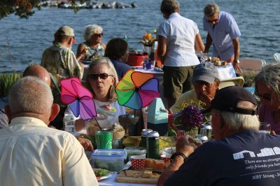 Great Community Picnic
The Mattapoisett Land Trust and Mattapoisett Museum collaborated to hold the annual Great Community Picnic on August 1 at Munro Preserve. Guests brought food, drink, centerpieces and in some cases festive costumes to the event that raises funds for both entities. Photos by Jared Melanson
