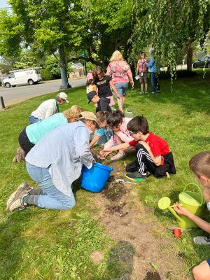 Dunseith Park
With a crew of eager third graders, Don Cuddy along with other members of the Mattapoisett Land Trust education committee planted sunflowers at Dunseith Park located at the corner of North Street and Route 6 recently. This is a continuation of a major goal by the land trust: educating children about our natural environment.

