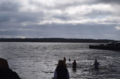 Polar Plunge
On New Years Day, hundreds were arrayed at Mattapoisett Town Beach for this year’s Mattapoisett Polar Plunge. Since 2013, the beach has seen residents and visitors run into the freezing Atlantic to kick off the new year. The event is held by Keep On Plungin’ who, through the selling of baked goods, coffee, and hot chocolate, donate all proceeds of the fridged plunge to local families grappling with the costs of cancer treatment. Photo by Sam Bishop.
