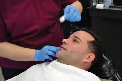 No Shave November
Time was up for five Rochester police officers participating in the department’s 2nd annual No Shave November who said farewell to their beards and goatees as cosmetology students at Old Colony treated the officers to a shave on December 1. Photos by Jean Perry
