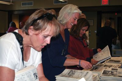 Presto Press
A partnership between the Mattapoisett Historical Society and the public library allowed the sale of duplicate issues of the Presto Press, which was printed from the 1950s until the early 1990s. People poured over the stacks seeking a specific issue or year to take home for their personal archives. The monies raised will be used to defray the cost of storing the publications in a climate-controlled space. Photos by Marilou Newell
