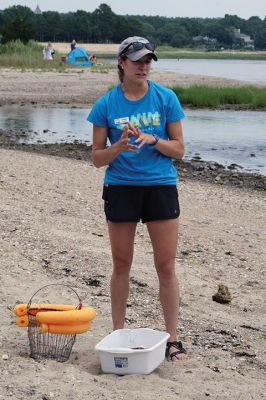 Buzzards Bay Coalition
Cassie Lawson of the Buzzards Bay Coalition led a group of 30 adults and children through the rigors of shellfishing on July 22 at the Mattapoisett town beach located adjacent to the YMCA camp. Lawson explained the physiology of the bivalves, how to use a shellfish rake, and the importance of obtaining a permit and being mindful of the difference between open and closed shellfish beds. Photo by Marilou Newel
