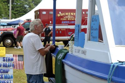 Farmers, Families, Fiddles 
Along with the sun on Saturday came the crowds to the Rochester Country Fair. Kid’s activities that were canceled on Friday resumed on Saturday under a blue sky. Photos by Jonathan Comey
