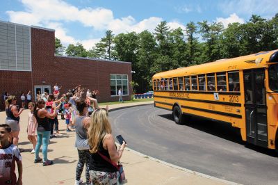 Rochester Memorial School
Rochester Memorial School students enjoyed their farewell to the 2022-23 school year on June 24, as RMS held its rowdy tradition featuring a faculty and staff orchestra serenading in song. Bus drivers took extra laps around the loop to the cheers of their families, as the children waved. Photos by Mick Colageo
