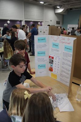 STEAM-A-Palooza
Rochester Memorial School held its second annual STEAM-A-Palooza event on May 15, as the community swarmed RMS to take in the students’ artwork adorning the school hallways, live musical performances and a cafetorium packed with displays of various science projects. Photos by Mick Colageo

